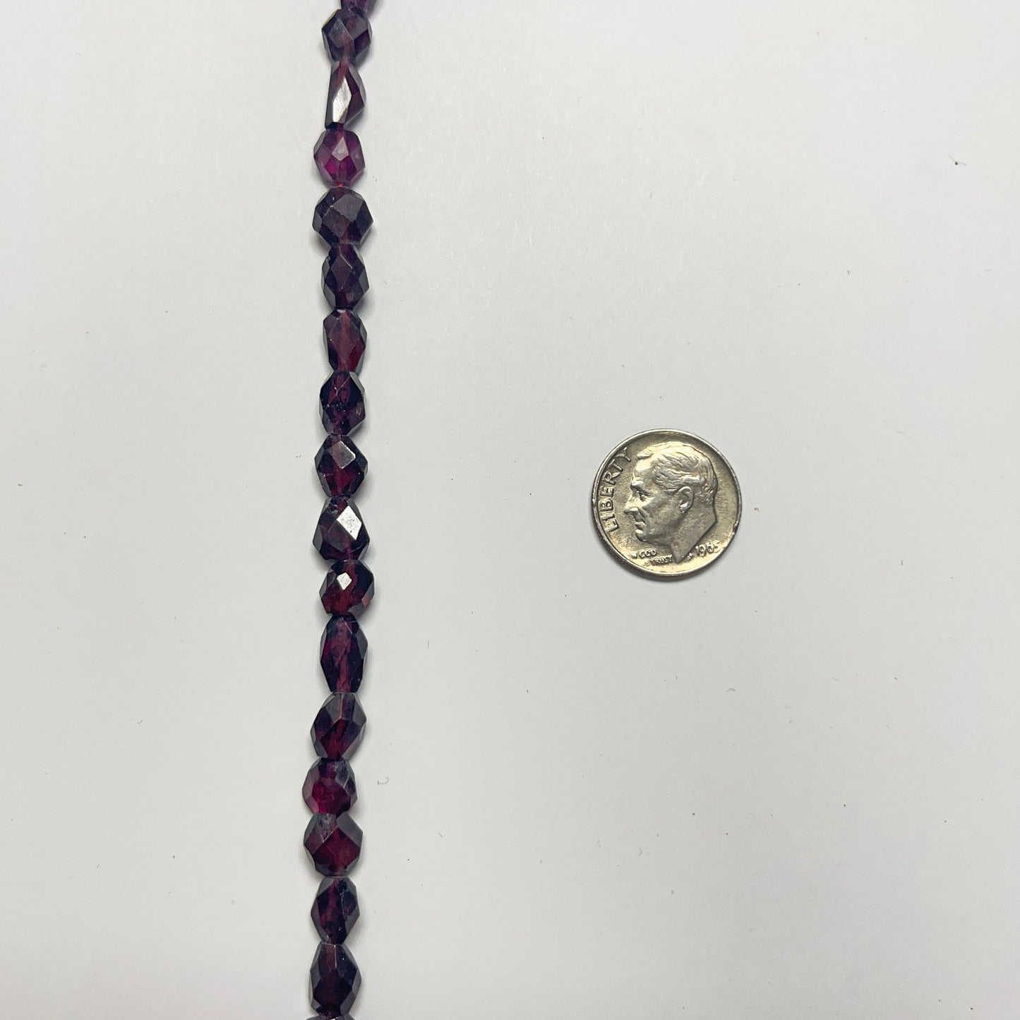 8–11mm x 6–7.5mm Faceted Oval Garnet 17 inch ~57 pcs/strand
