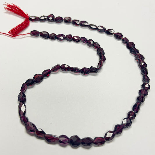 6–6.5mm x 4–4.5mm Faceted Flat Oval Garnet 14 inch ~54 pcs/strand