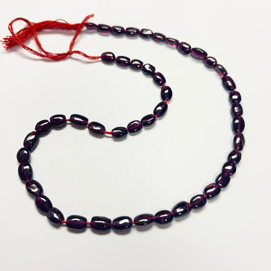 7–7.5mm x 5–5.5mm Smooth Oval Garnet 14 inch ~51 pcs/strand