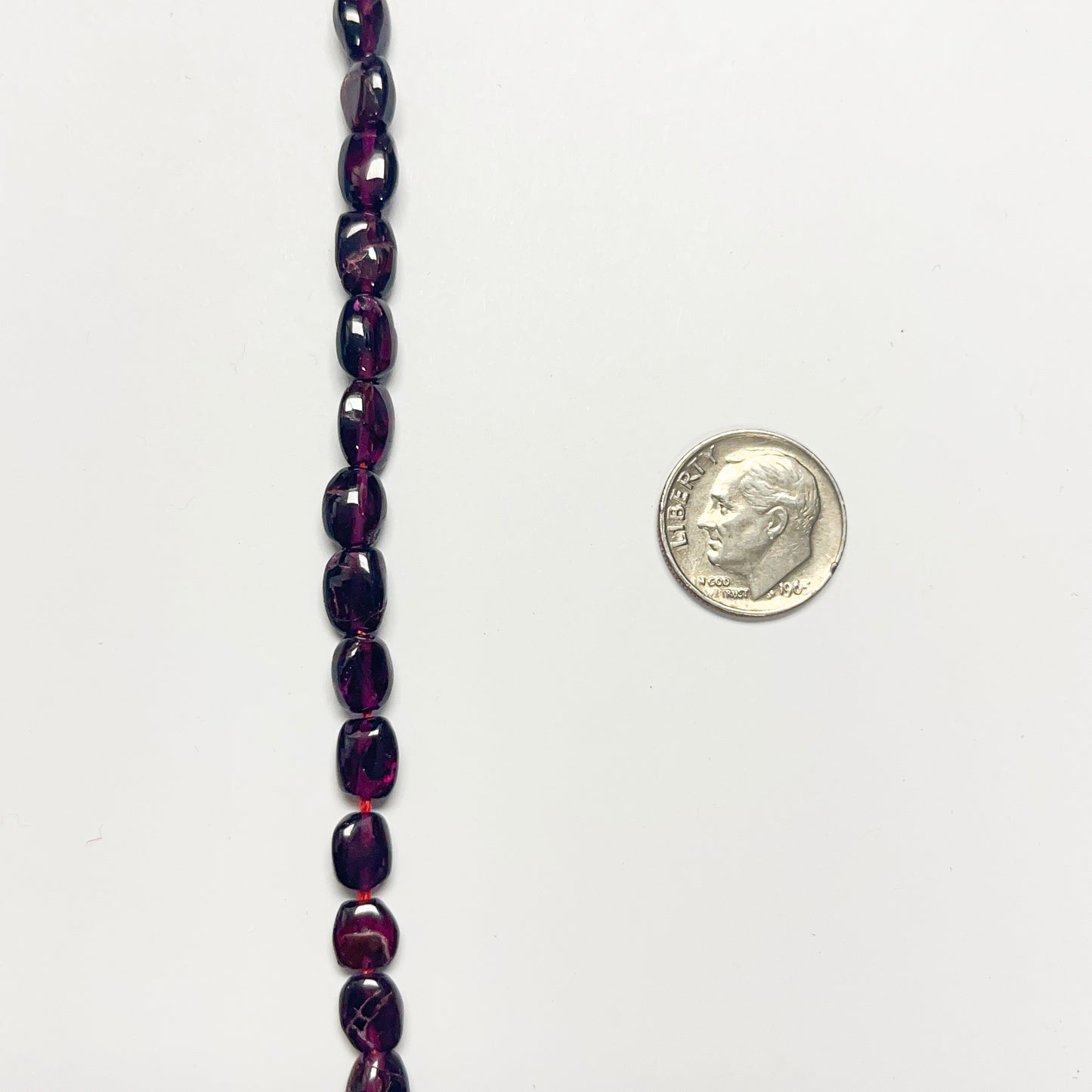 7–8mm x 5.5–6mm Smooth Oval Garnet 14 inch ~47 pcs/strand