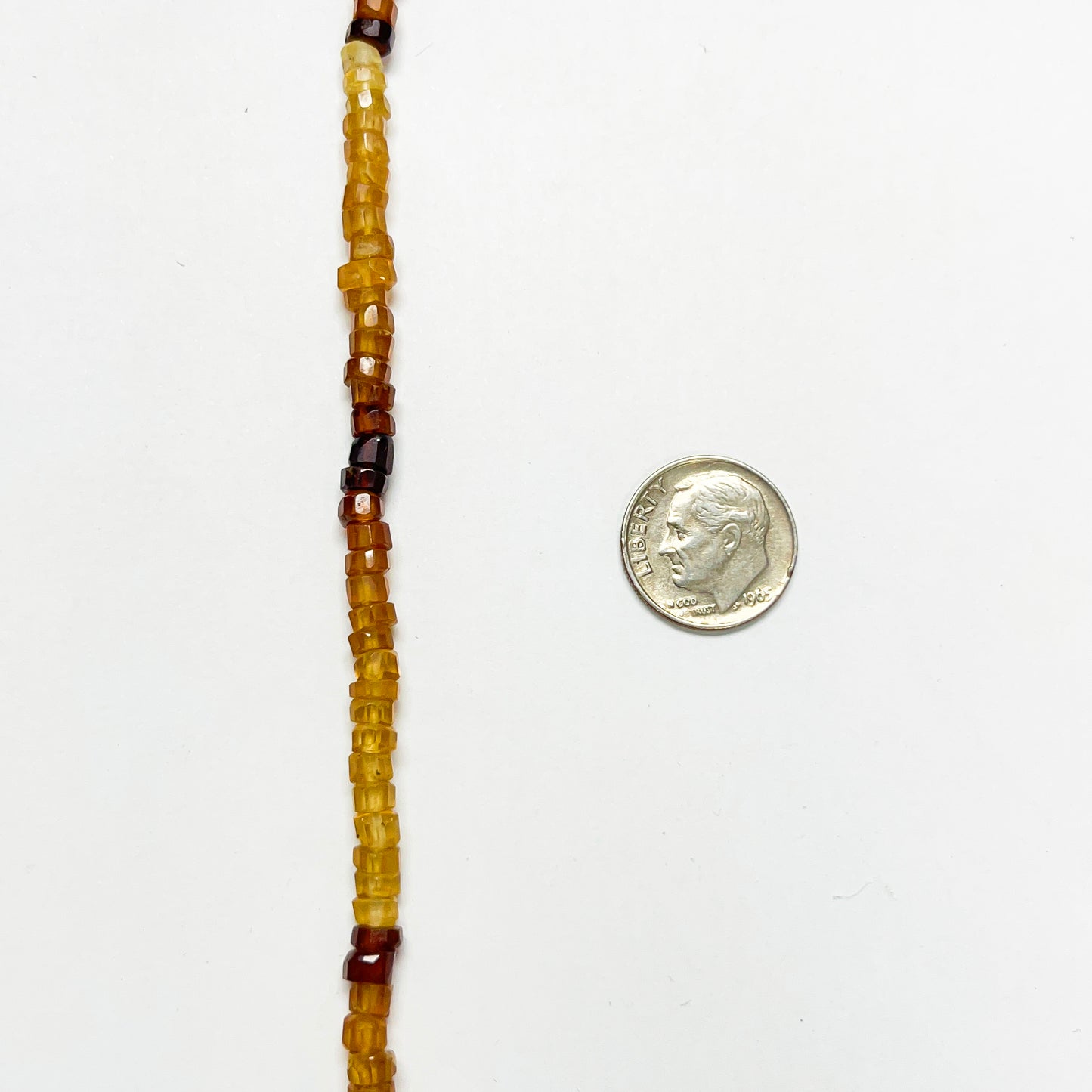 2–3mm x 4.5–5mm Faceted Hessonite Tires 14 inch ~135 pcs/strand