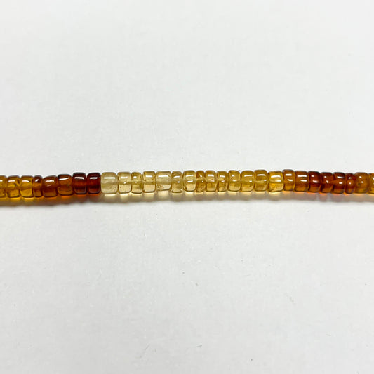 2–3mm x 4–4.5mm Smooth Hessonite Tires 14.5 inch ~148 pcs/strand