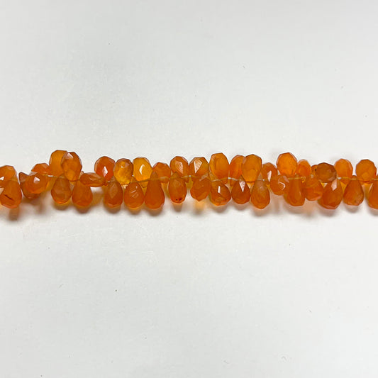 3.5–4.5mm x 7–8mm Faceted Carnelian Drops 16 inch ~165 pcs/strand