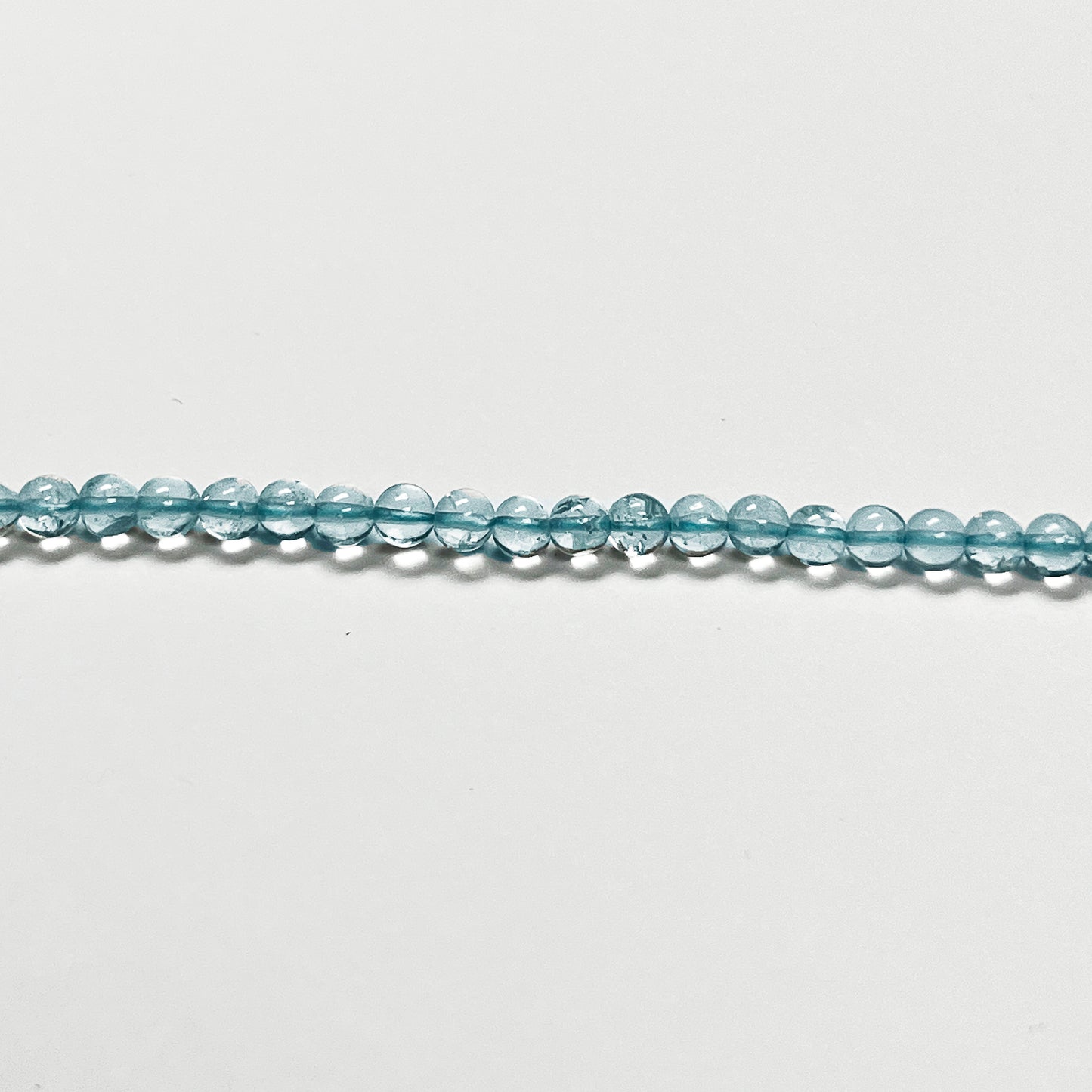 4.1-4.5mm Smooth Swiss Blue Topaz Round 14.5 inch 80-85 pcs/strand