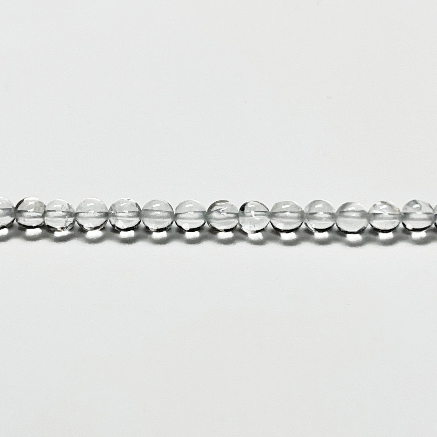 3.5–3.9mm Smooth Round Clear Quartz 14.2 inch 107 pcs/strand AAA High Quality