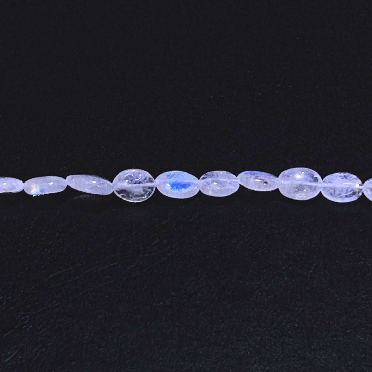 5–6mm x 8–9mm Oval Rainbow Moonstone 14.5 inch 50 pcs/strand