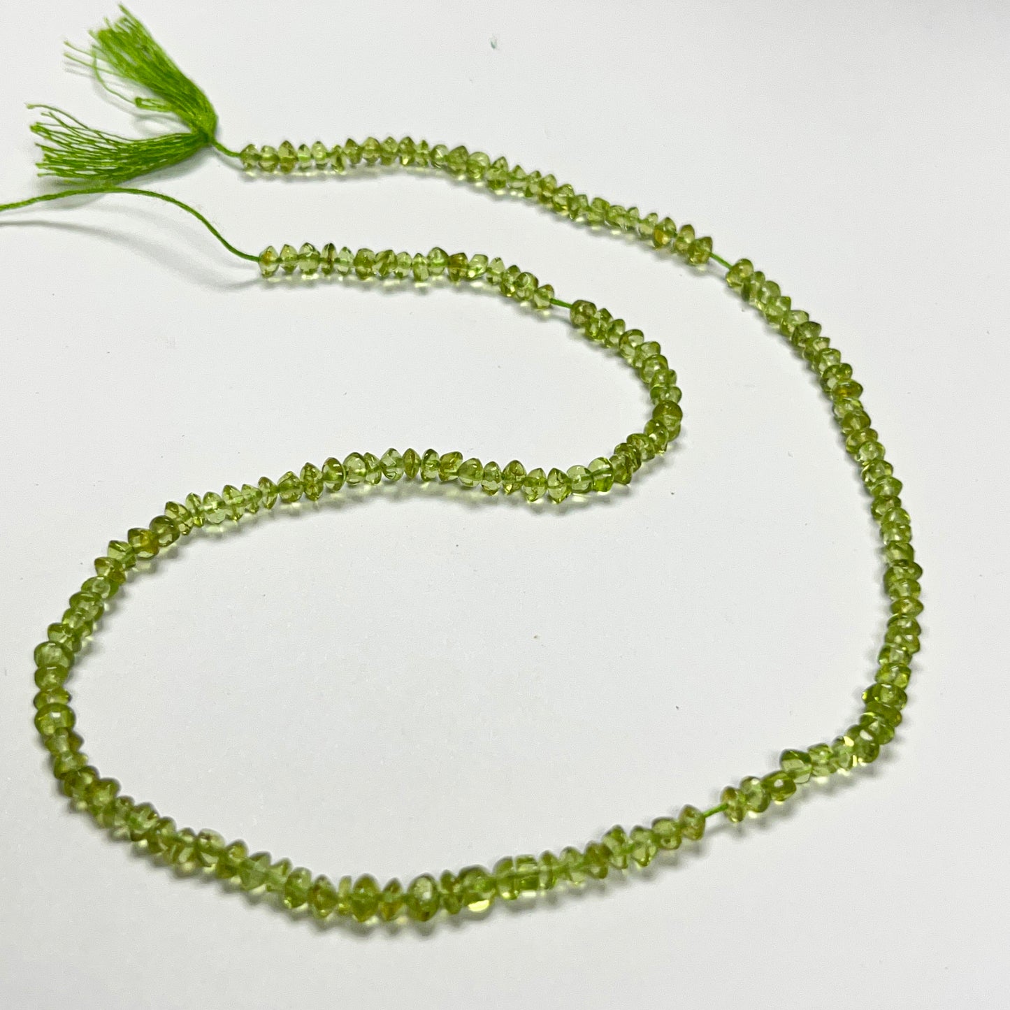 3–3.5mm Plain Rondelle Peridot 14.5 inch 166 pcs/strand