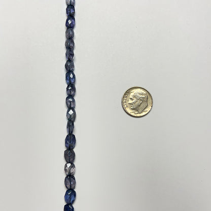 7–8mm x 5–6.5mm Faceted Oval Iolite 14.5 inch ~52 pcs/strand