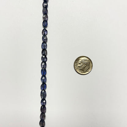 6–7mm x 5–6mm Faceted Oval Iolite 14.5 inch ~52 pcs/strand