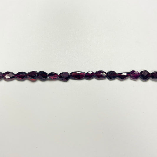 7–7.5mm x 5–5.5mm Faceted Oval Garnet 14 inch ~56 pcs/strand