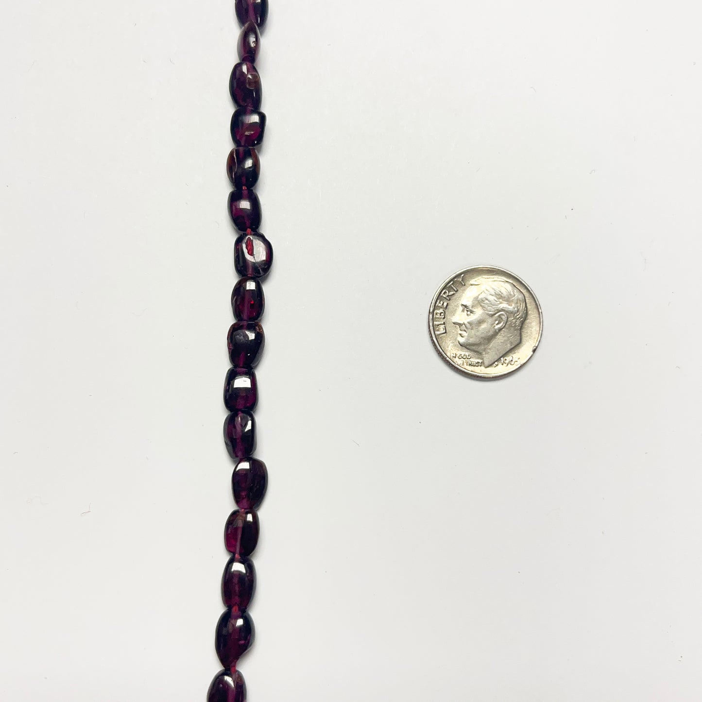 7–7.5mm x 5–5.5mm Smooth Oval Garnet 14 inch ~51 pcs/strand