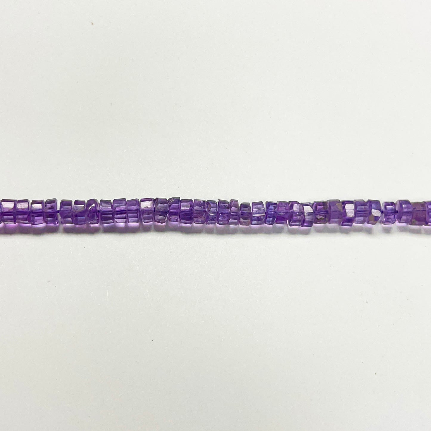 2–3.5mm x 4–5mm Faceted Amethyst Tires 14.5 inch ~143 pcs/strand