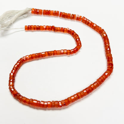1.5–3mm x 4–4.4mm Faceted Carnelian Tires 15 inch ~65 pcs/strand