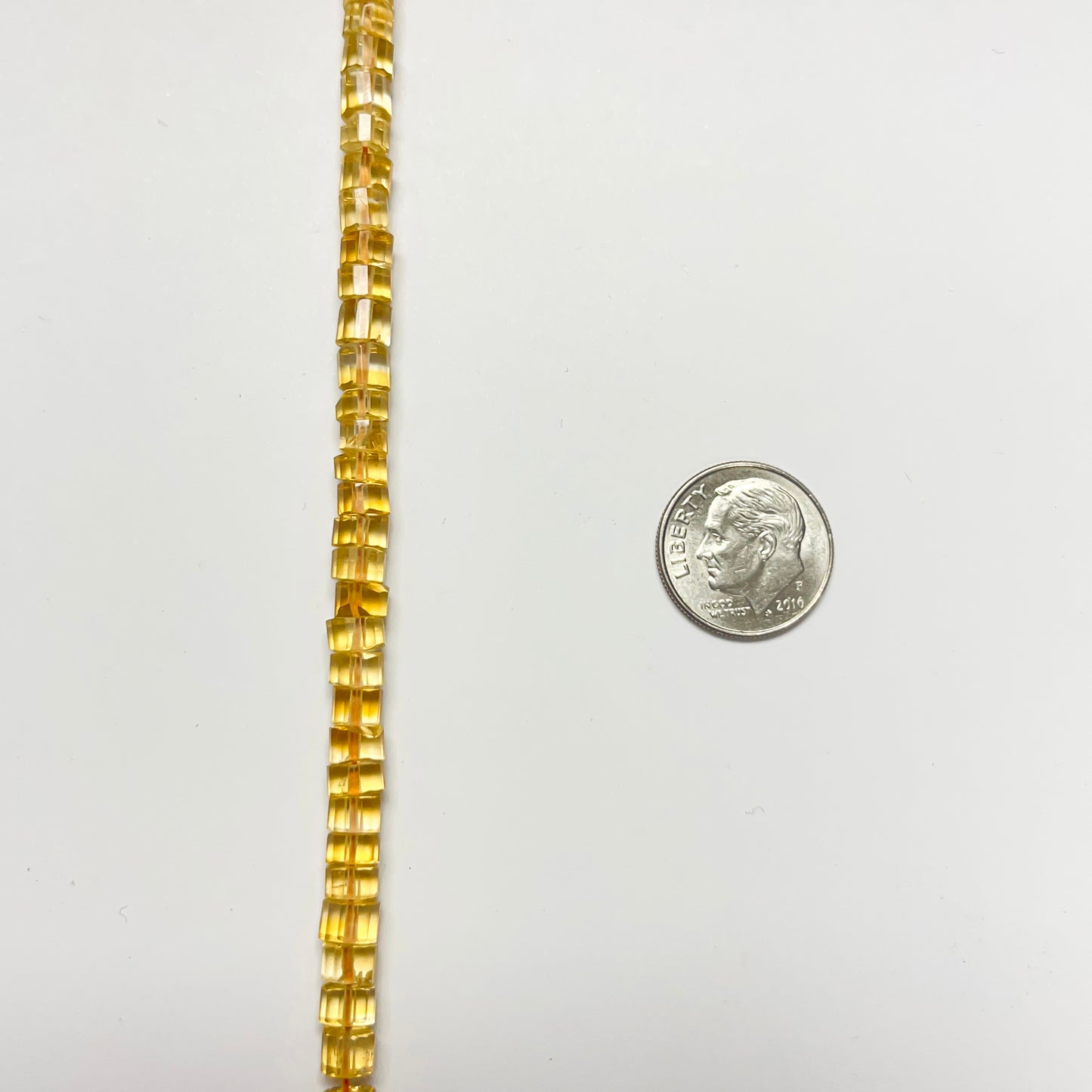 2–3.5mm x 4.5–5mm Faceted Citrine Tires 14 inch ~107 pcs/strand