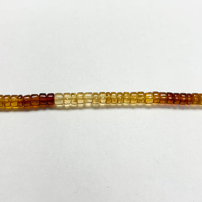 2–3mm x 4–4.5mm Smooth Hessonite Tires 14.5 inch ~148 pcs/strand