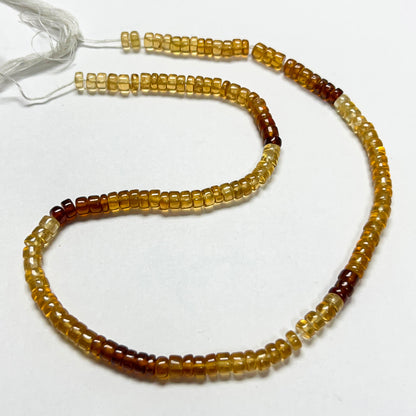 2.5–3.5mm x 5mm Smooth Hessonite Tires 14 inch ~134 pcs/strand