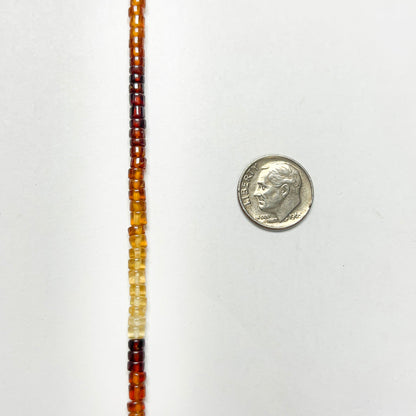 2–3mm x 4–4.5mm Smooth Hessonite Tires 14.5 inch ~148 pcs/strand