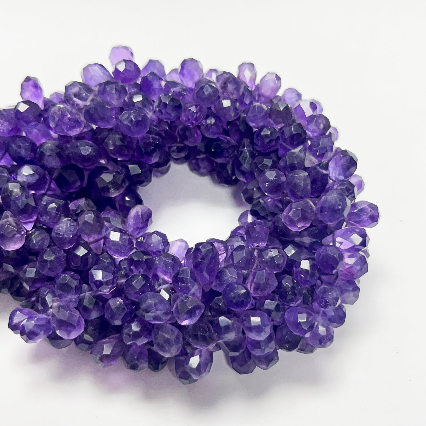 6–7mm x 9–12mm Faceted African Amethyst Drops 14 inch 92 pcs/strand
