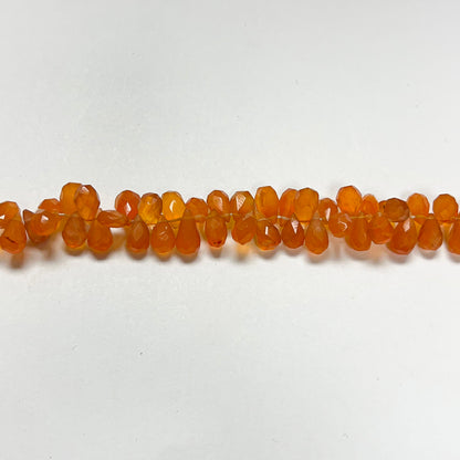 3.5–4.5mm x 7–8mm Faceted Carnelian Drops 16 inch ~165 pcs/strand