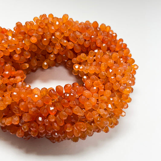 3.5–4.5mm x 7–8mm Faceted Carnelian Drops 16 inch ~165 pcs/strand