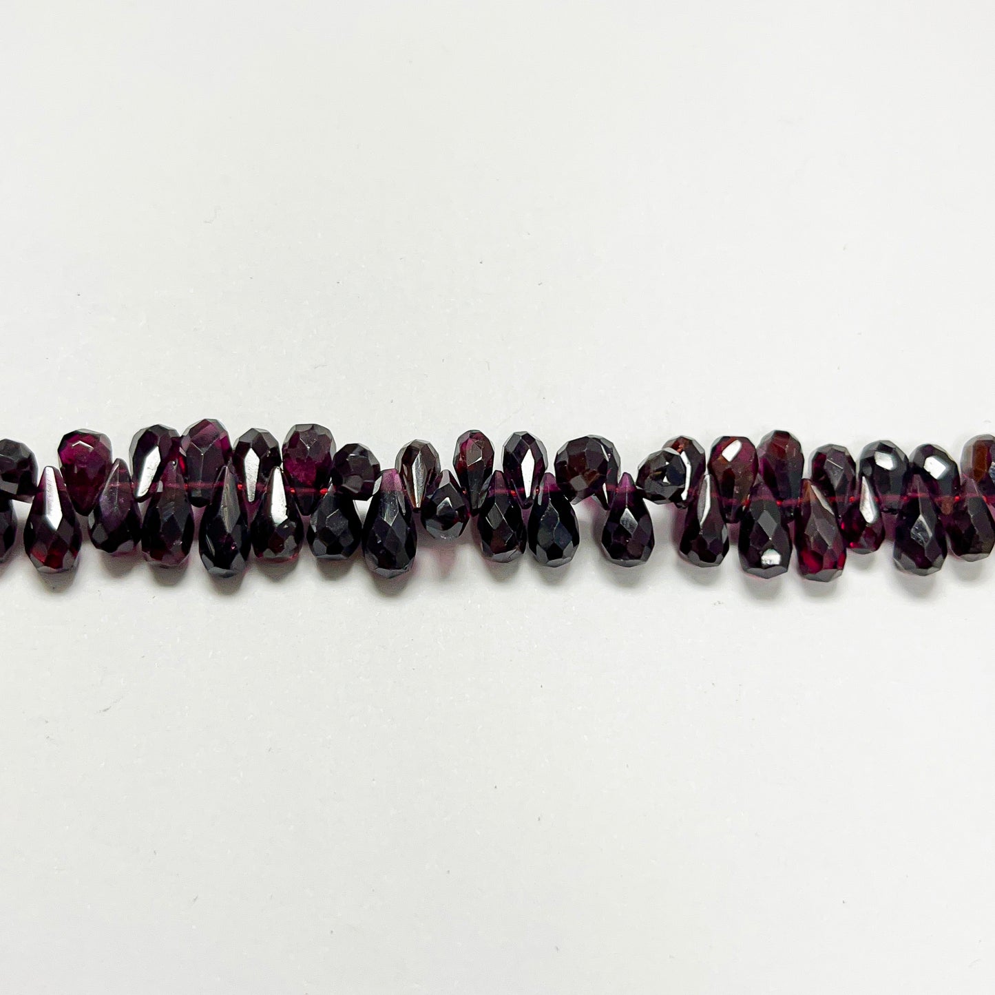 4–4.5mm x 8–9mm Faceted Garnet Drops 14 inch ~155 pcs/strand