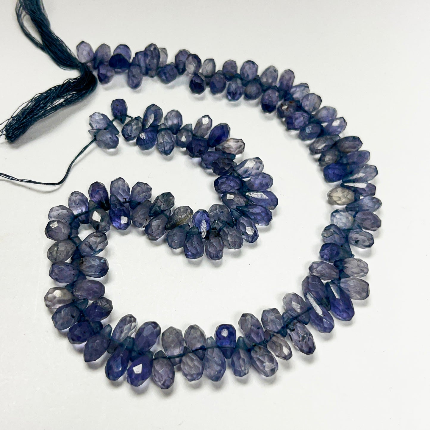 5–6mm x 9–10mm Faceted Iolite Drops 14 inch ~110 pcs/strand