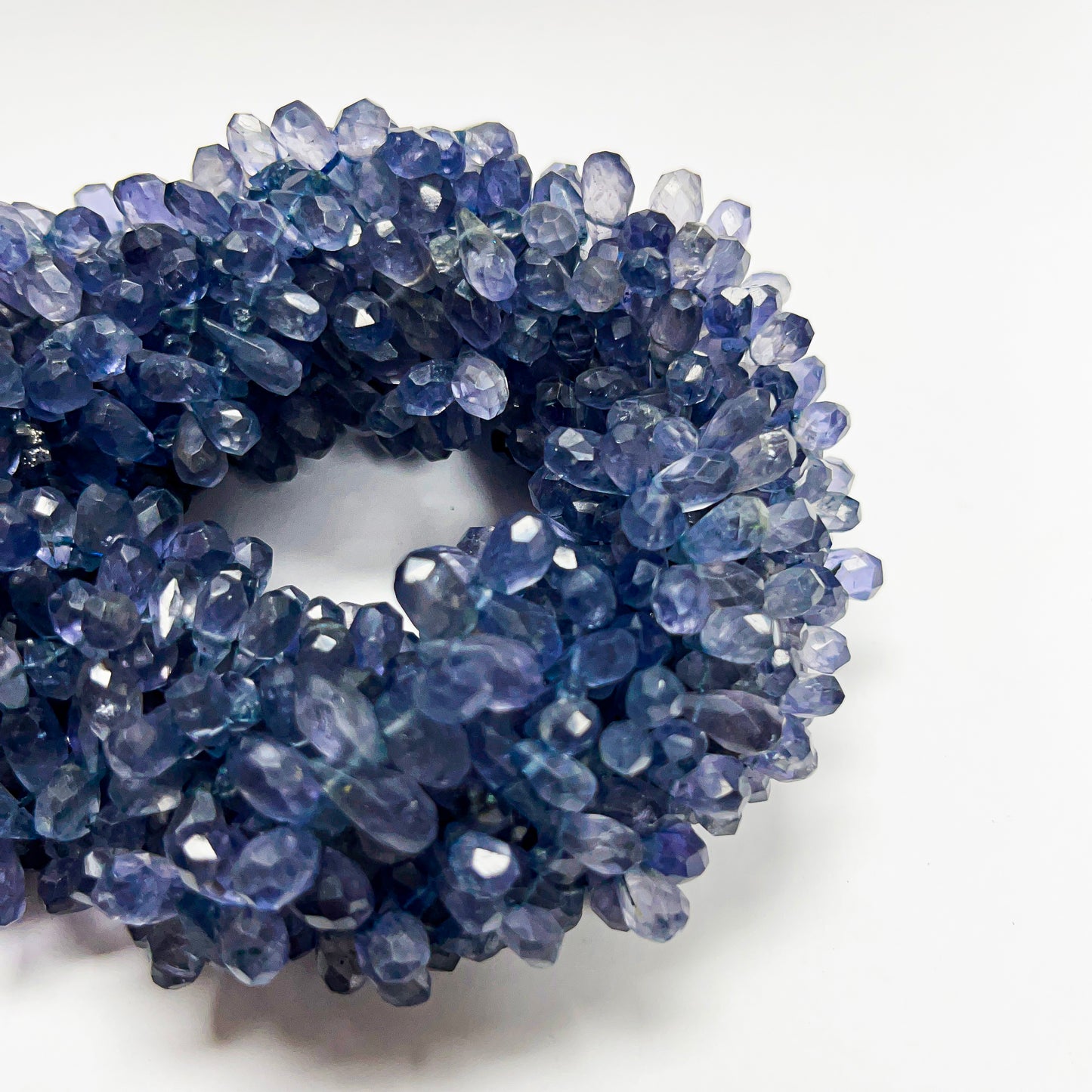4mm x 6–9mm Faceted Iolite Drops 14 inch ~130 pcs/strand