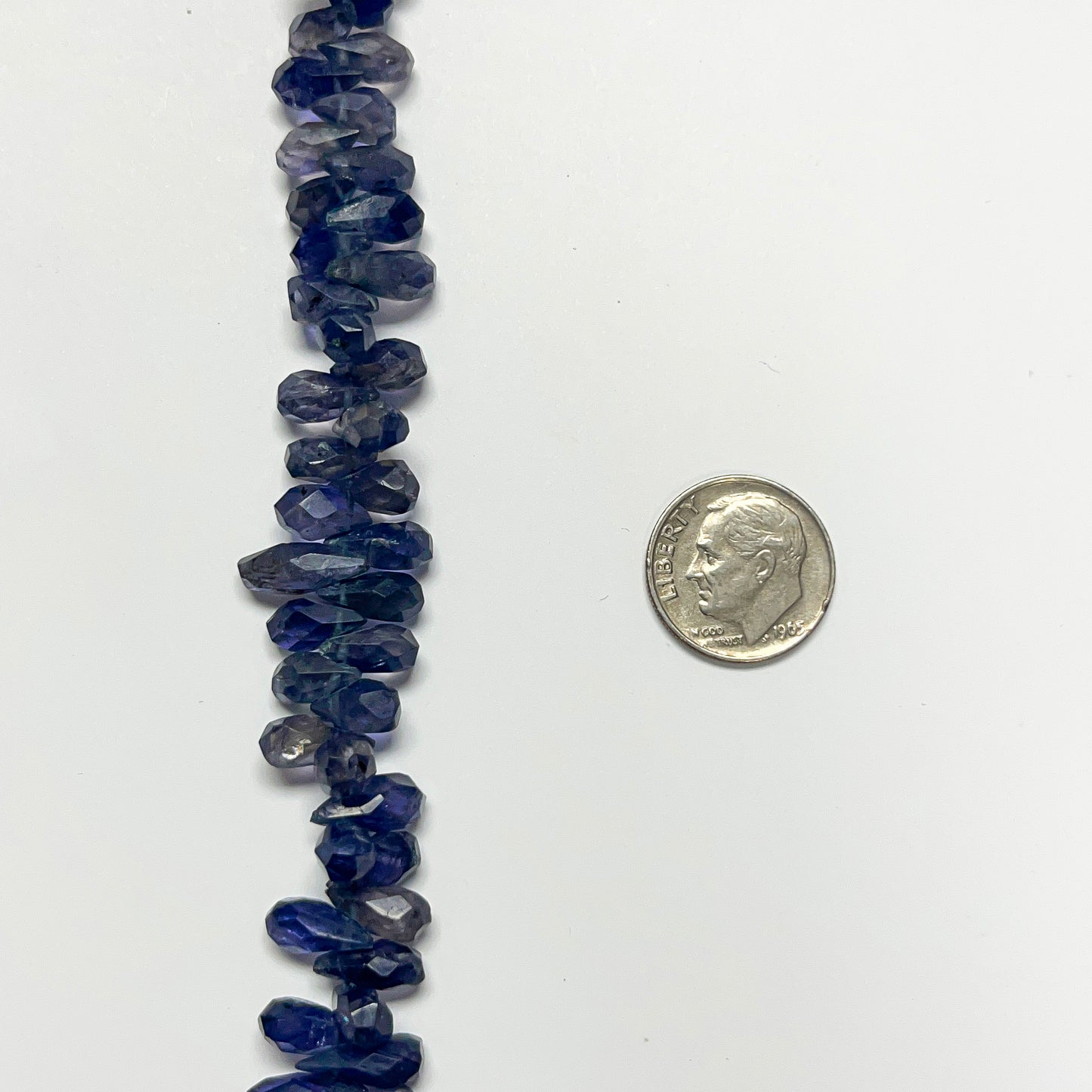 4mm x 6–9mm Faceted Iolite Drops 14 inch ~130 pcs/strand