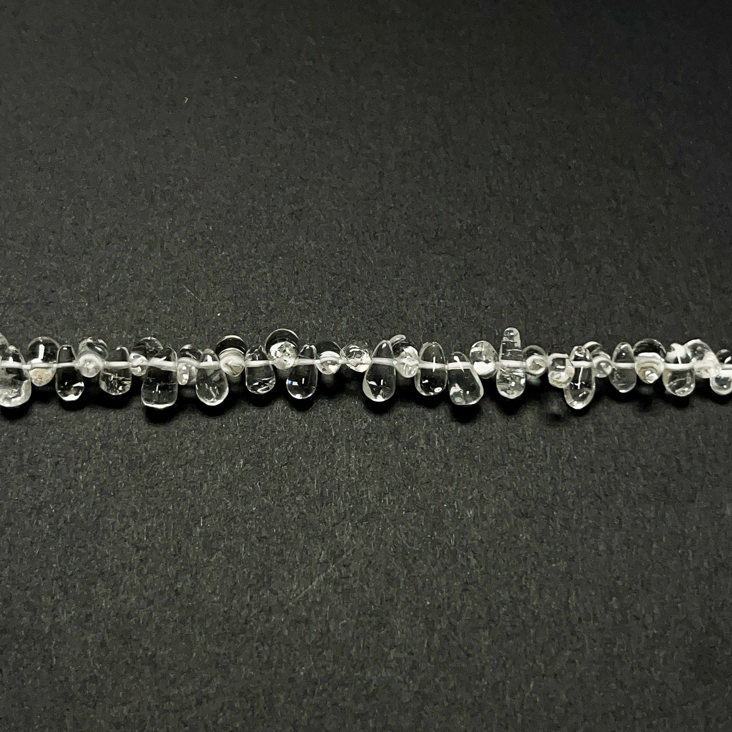 4–5mm x 8–12mm Plain Rock Crystal Drops 14 inch ~115 pcs/strand